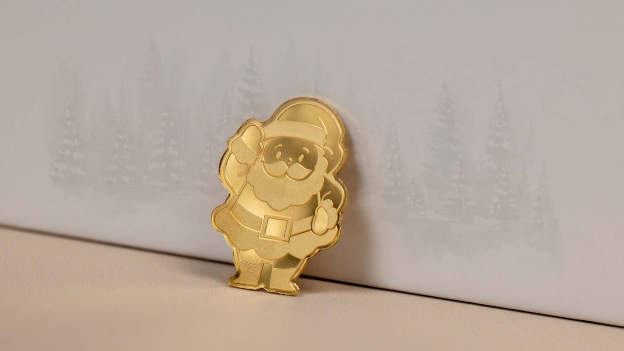 (W168.1.1.D.n.d._2022_.30095) Palau 1 Dollar Santa Claus (2022) - Silk finish gold (blog illustration) (zoom)