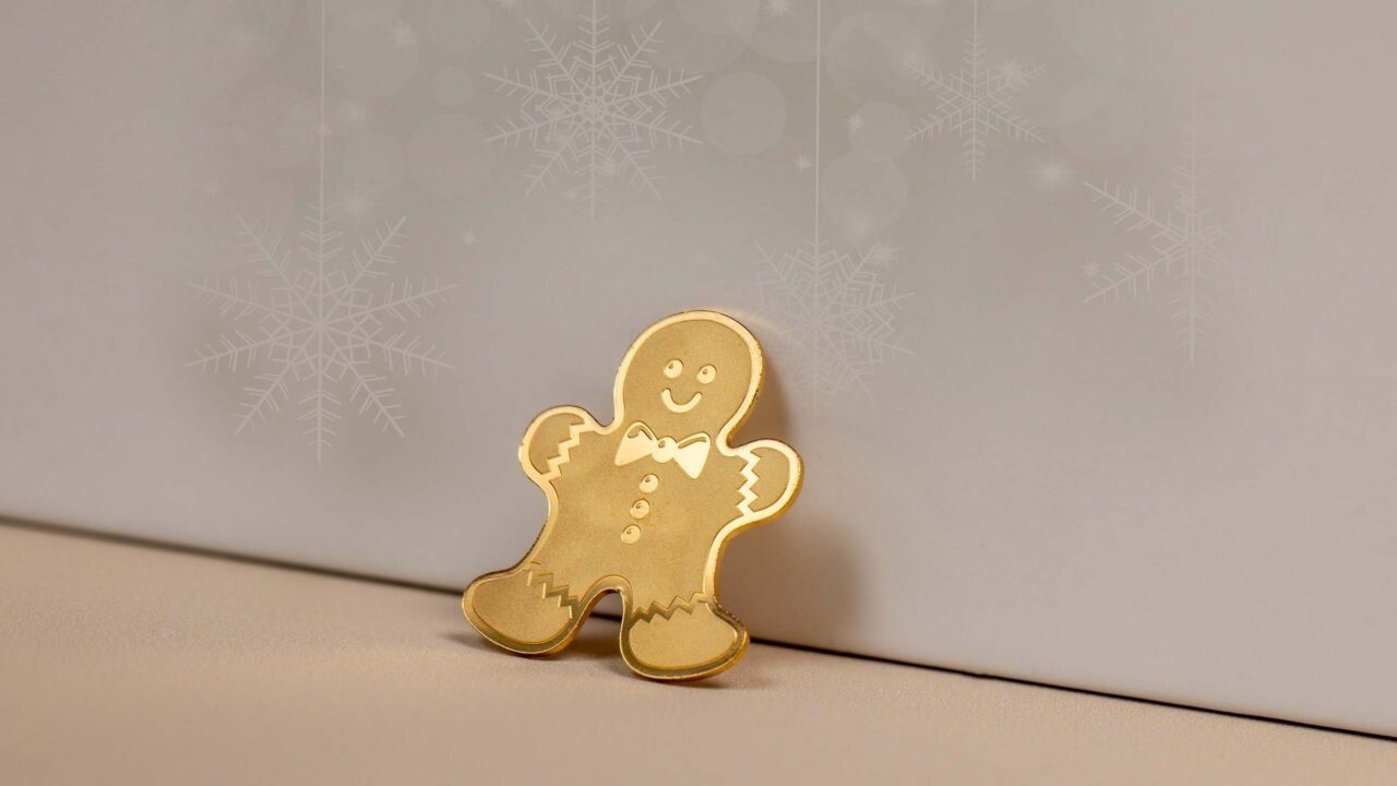 (W168.1.1.D.n.d._2022_.30096) Palau 1 Dollar Gingerbread Man (2022) - Silk finish gold (blog illustration) (zoom)